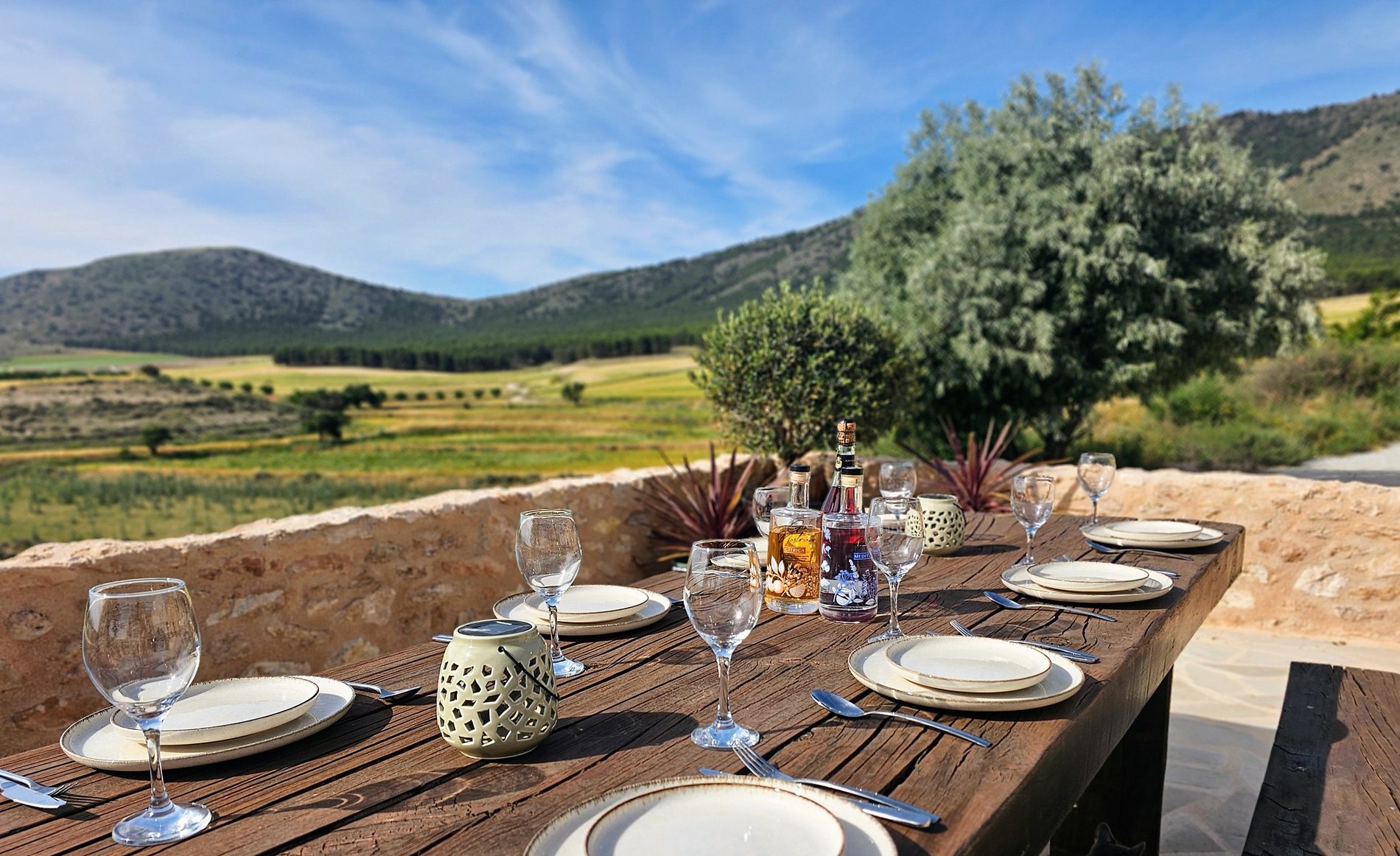 Outdoor dining table with countryside views at Leonard’s Lookout