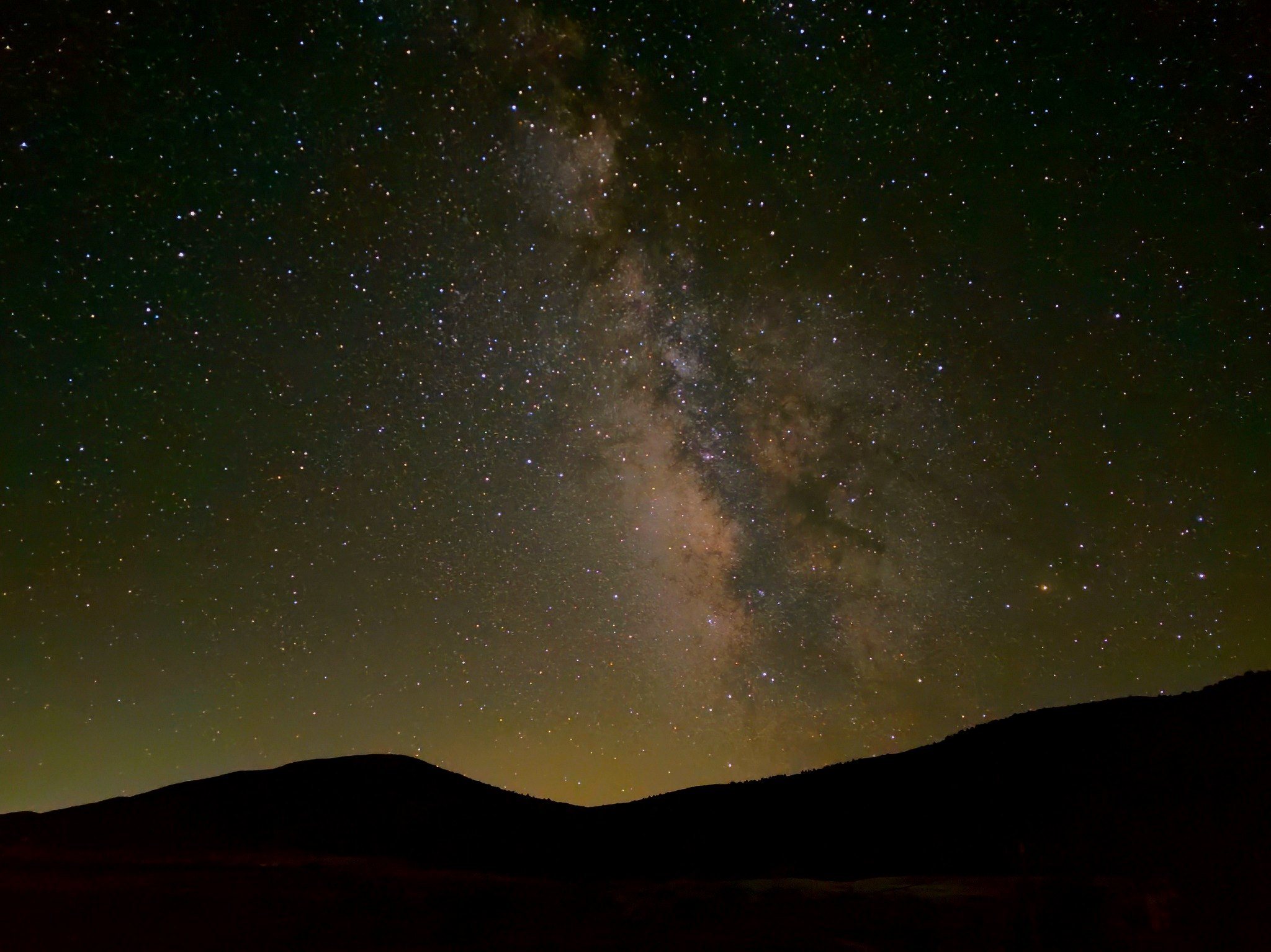 Milky Way above the dark rural landscape near Leonard’s Lookout