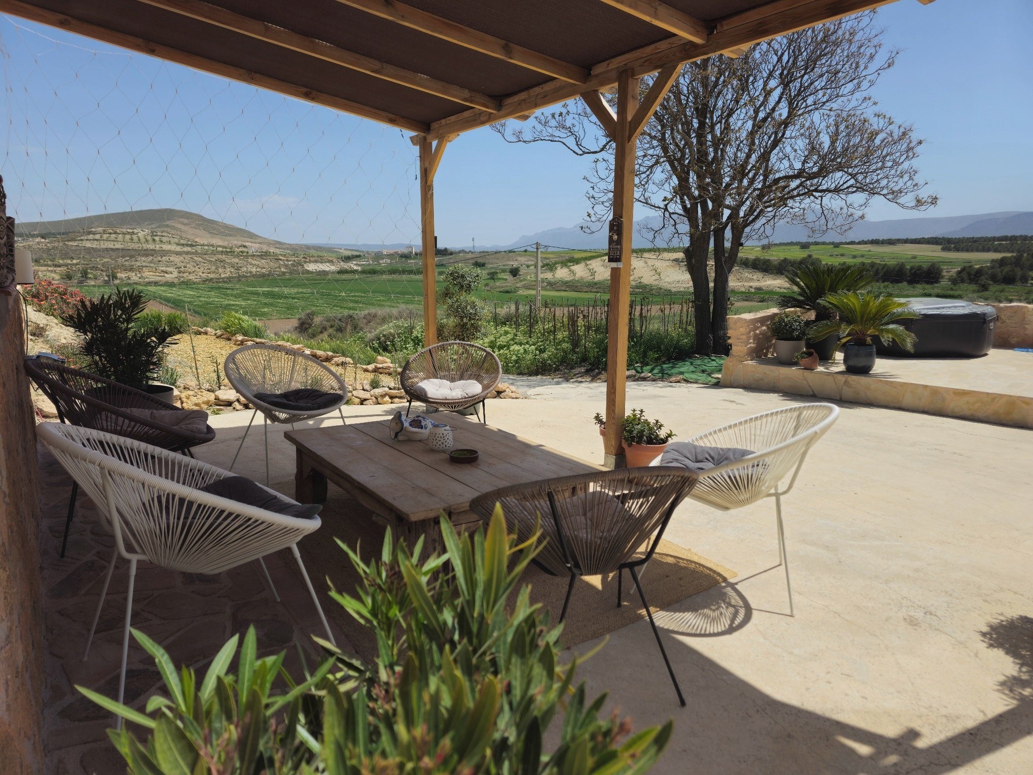 Covered terrace and countryside views at Leonard’s Lookout near Orce