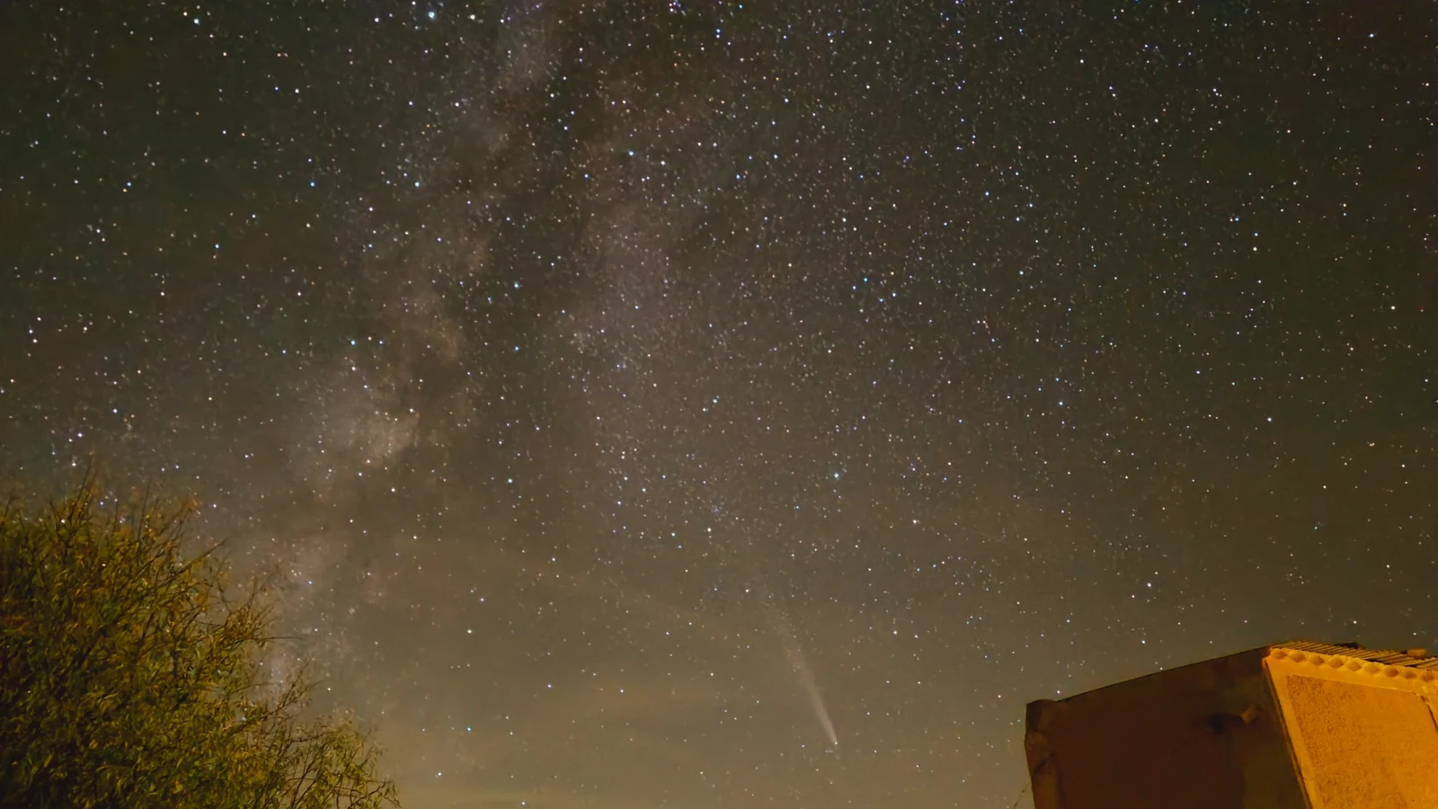 Milky Way and comet above the mountain horizon and Leonard’s Lookout under rural night skies