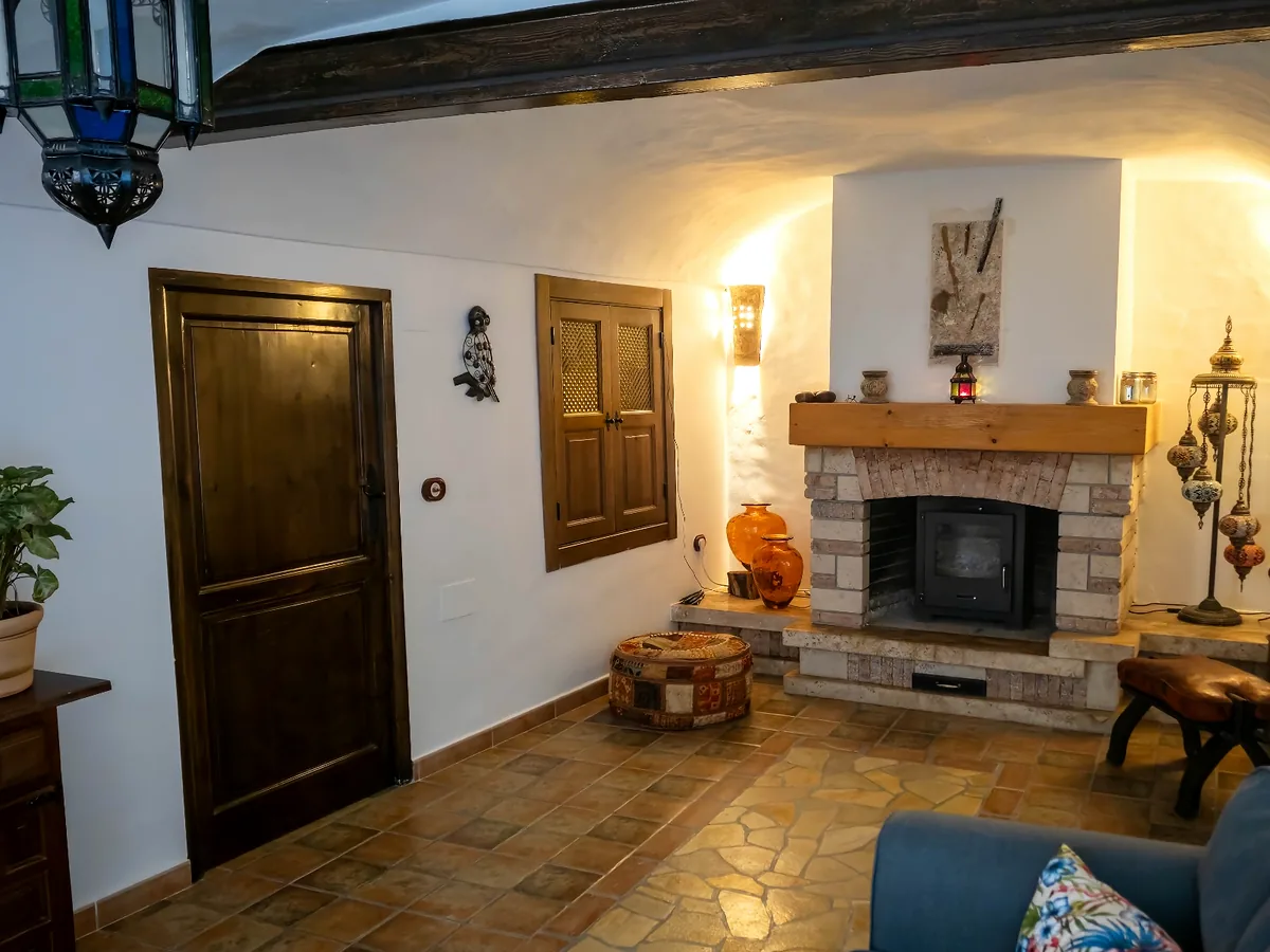 Fireplace room with arched ceiling at Leonard's Lookout