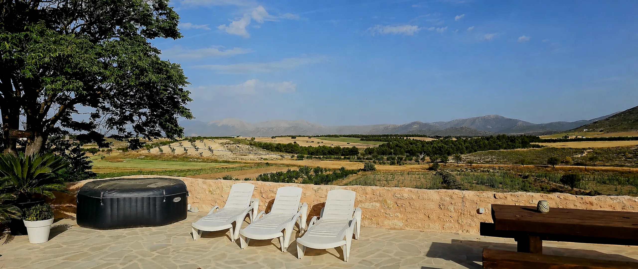 leonards-lookout-cave-house-terrace-hot-tub-mountain-views-hero