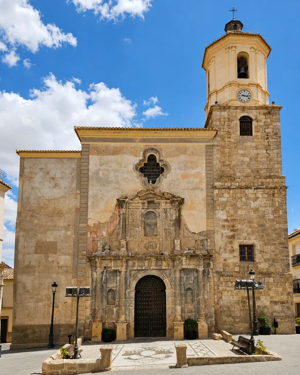 Church of Santa María in Orce, Granada, with its historic stone façade and bell tower