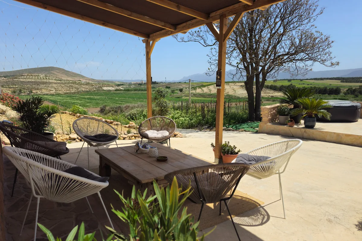 Outdoor dining and seating area on the terrace at Leonard’s Lookout
